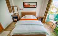 Kamar Tidur 3 Beach Sunrise Inn