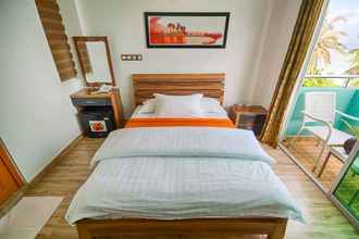 Kamar Tidur 4 Beach Sunrise Inn