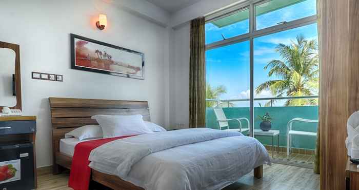 Bilik Tidur Beach Sunrise Inn