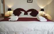 Kamar Tidur 6 The White Cottage B&B