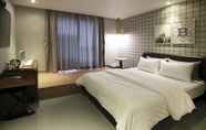 Kamar Tidur 4 Brown Dot Hotel