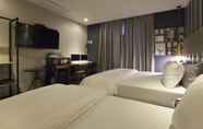 Kamar Tidur 2 Brown Dot Hotel