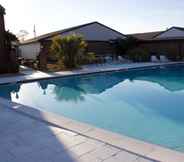 Swimming Pool 5 At Home Inn & Suites