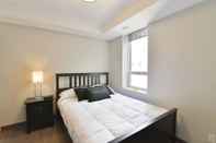 Bedroom Lisgar Street Apartments by CorporateStays