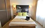 Bedroom 7 Appart Hôtel Mer & Golf City Bordeaux - Bassins à Flot