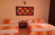 Kamar Tidur 5 Hotel Tumburagua Inn