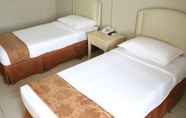 Kamar Tidur 7 LeGallery Suites Hotel