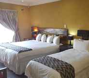 Kamar Tidur 4 Acre of Africa Guest Venue