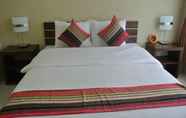 Kamar Tidur 3 The Flamingo Hotel