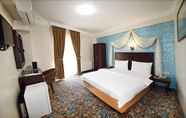 Bedroom 2 Hotel Grand Umit