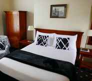 Bilik Tidur 4 Highland House Boutique Hotel