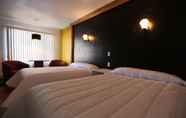 Bedroom 6 Motel Le Riviera