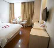 Kamar Tidur 3 Xin Yue Xin Hotel