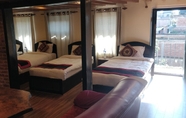 Kamar Tidur 5 Tulaja Boutique Hotel