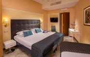 Kamar Tidur 4 Amalia Suites