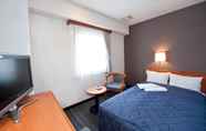 Kamar Tidur 4 Hotel Unisite Sendai