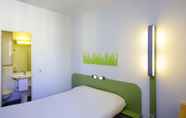 Bedroom 2 ibis budget Lyon Saint Genis Laval