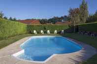 Swimming Pool Hôtel Le Chalet de la Forêt