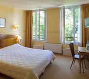Bedroom 2 Hôtel Le Chalet de la Forêt