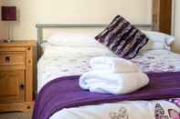 Kamar Tidur Common Farm Motel