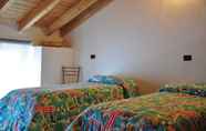 Kamar Tidur 4 Comoholidays - Casa Mirella