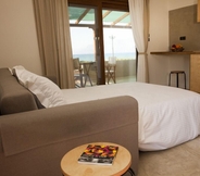 Bedroom 6 Horizonte Seafront Suites