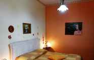 Kamar Tidur 4 B&B Il Ghiro - Country House