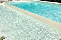 Swimming Pool Villa Don Camillo Relais