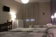 Phòng ngủ Hotel La Grotta