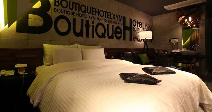 ห้องนอน Boutique Hotel XYM