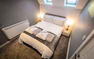 Bedroom 5 Aaron Wise Serviced Apartments