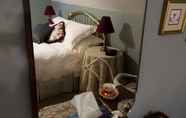 Kamar Tidur 7 Tea Cozy Bed & Breakfast