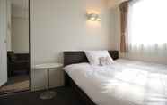 Kamar Tidur 4 7 Days Hotel Plus