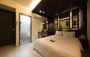 Bilik Tidur 2 Achasan Station Wall Hotel