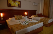 Bedroom 4 Laphetos Beach Resort & Spa - All Inclusive
