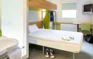 Bedroom 4 ibis budget Montauban Les Chaumes