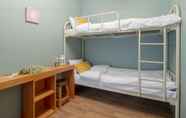 Kamar Tidur 7 Cozzzy Guest House - Hostel