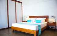 Bedroom 7 Ubuntu Beach Villas by Reveal