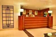 Lobi Rush Inn Hotel