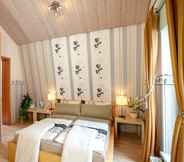 ห้องนอน 6 Ferienwohnungen & Gästezimmer Kachel
