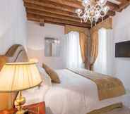 Bedroom 6 San Teodoro Palace Luxury Apartments
