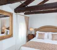 Bedroom 3 San Teodoro Palace Luxury Apartments