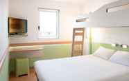 Bedroom 7 ibis budget Lyon Confluence