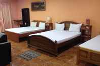 Kamar Tidur Sunshine Hotel & Hall