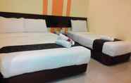 Kamar Tidur 2 Sun Inns Hotel Pasir Penambang