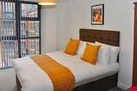 Phòng ngủ UR STAY Apartments Birmingham - Jewellery Quarter