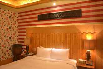 Kamar Tidur 4 Seasons Boutique Motel