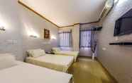 Kamar Tidur 4 Hou Kong Hotel