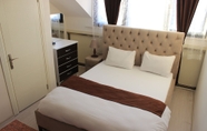 Kamar Tidur 6 Blue Life Suites