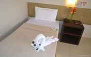 Kamar Tidur 4 Columbus Plaza Hotel